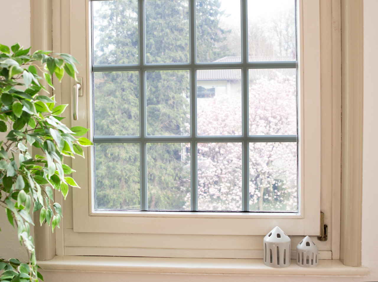 A window covered with d-c-fix® static sun protective film to effectively reduce solar radiation and heat build-up.